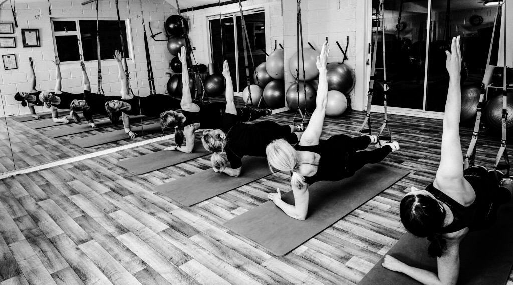 Side Plank - Group TRX Session at The Lair